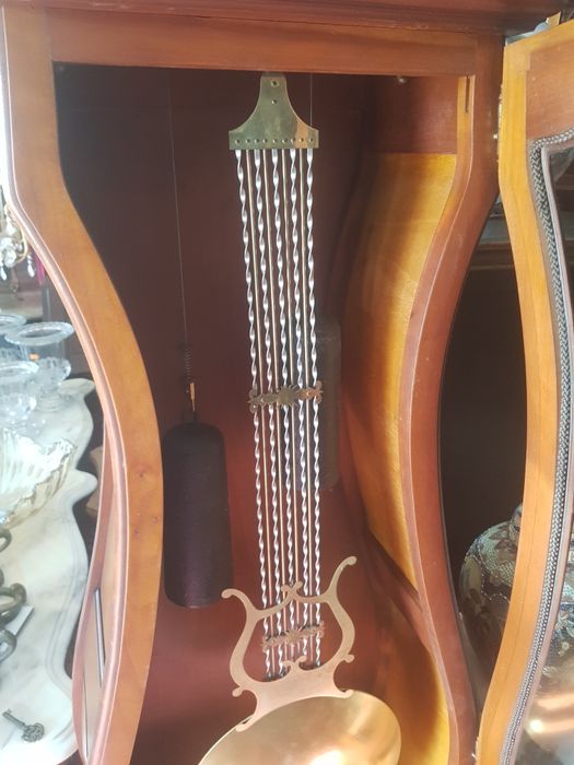 Relógio de coluna a corda