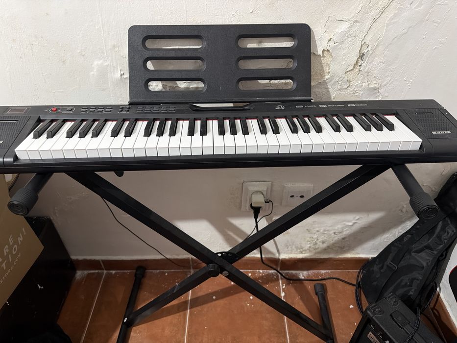 Teclado eletrônico MQ Yuedan 6191 de 61 teclas, modelo para iniciantes.