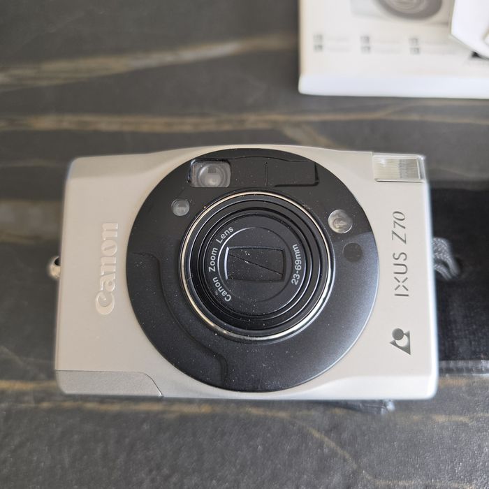 Câmara Analógica Canon IXUS Z70 – Pack Completo com Caixa e Manuais (Vintage)
