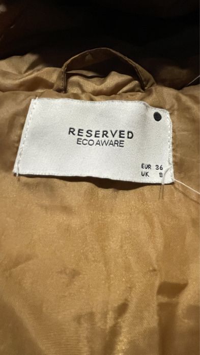 Beżowy puchowy płaszcz damski reserved r.s