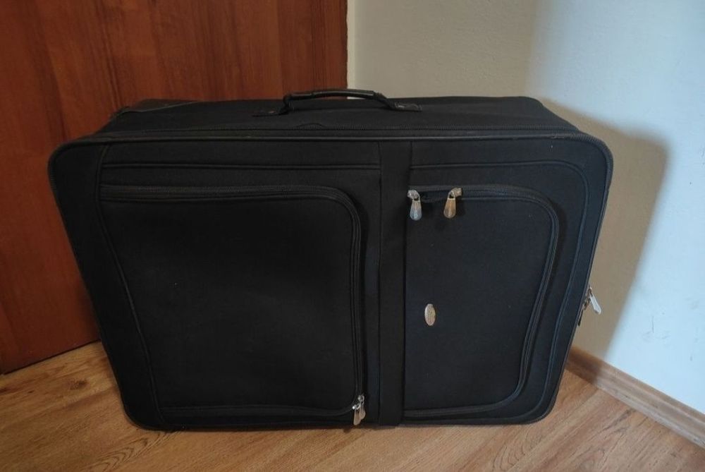 Walizka duża podróżna na kółkach obrotowych miękka , solidna bagaż.