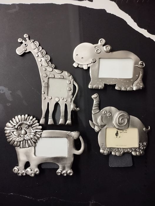 4 molduras de animais em metal novas