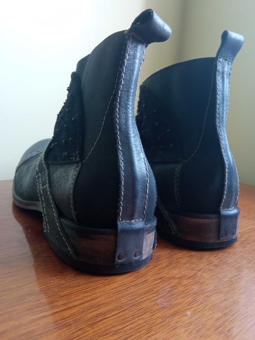 Кожаные ботинки              .