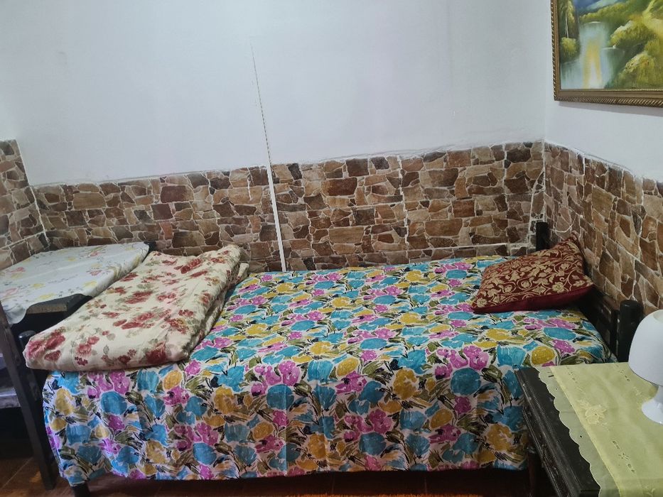 Alugo quarto  em ambiente familiar