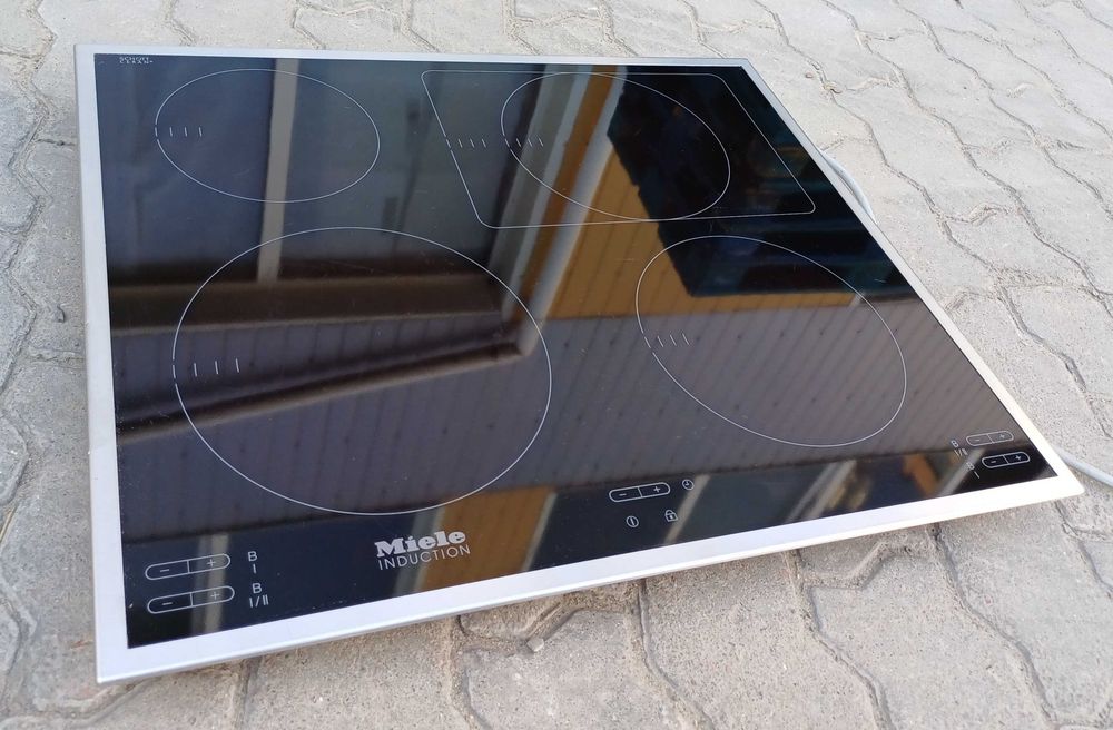 Вбудована варильна поверхня індукційна 60 см Міле Miele KM 6115 бустер б/в встраиваемая индукционная поверхность плита Миле б/у
