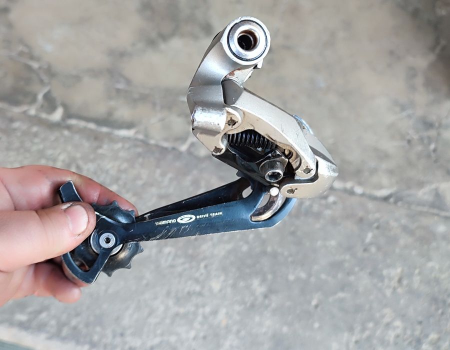 Задний переключатель Shimano DEORE LX RD-M580 GS на 9 скоростей: 1