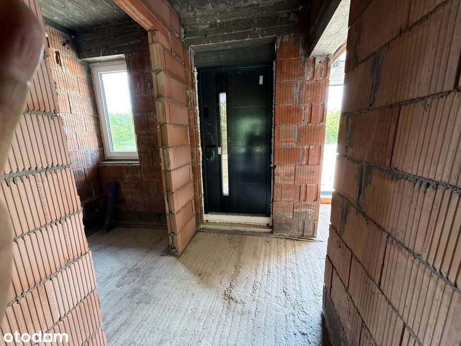 Nowoczesny dom w zabudowie bliźniaczej – 167 m² z garażem i poddaszem.