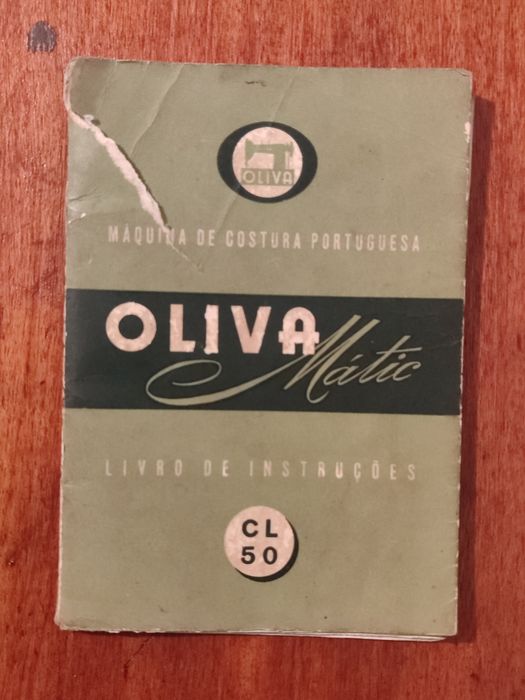 Máquina de costura Oliva em bom estado