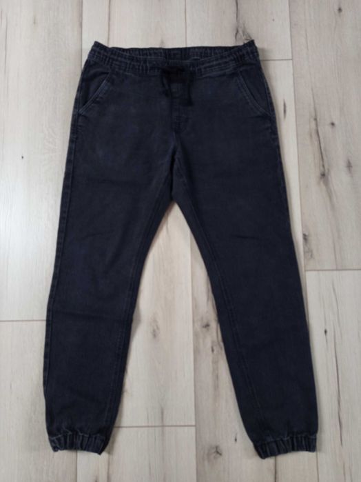 Męskie spodnie joggers SINSAY L