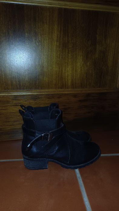 Botas pretas salto