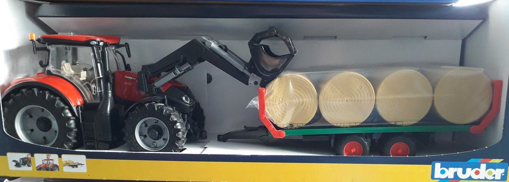 Bruder Traktor Case IH Optum 300 CVX z przyczepą z belami