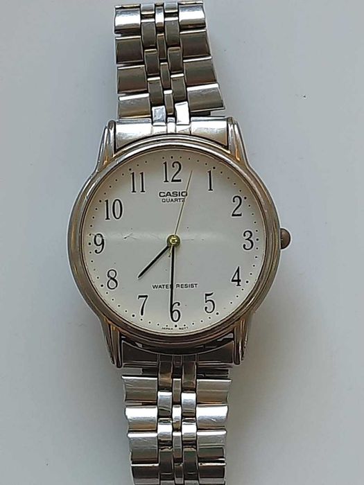Мужские часы CASIO QUARTZ  MTP-1084 MDVT б/у