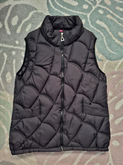 Жилетка, безрукавка жіноча.