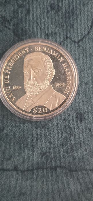 Moeda 20 dólars prof