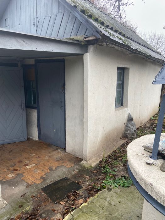 Продам половину газифікованого будинку в м.Сміла із літньою кухнею