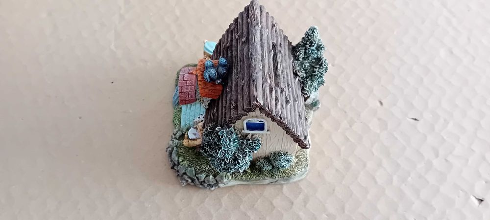 Mealheiro em forma de casa inglesa