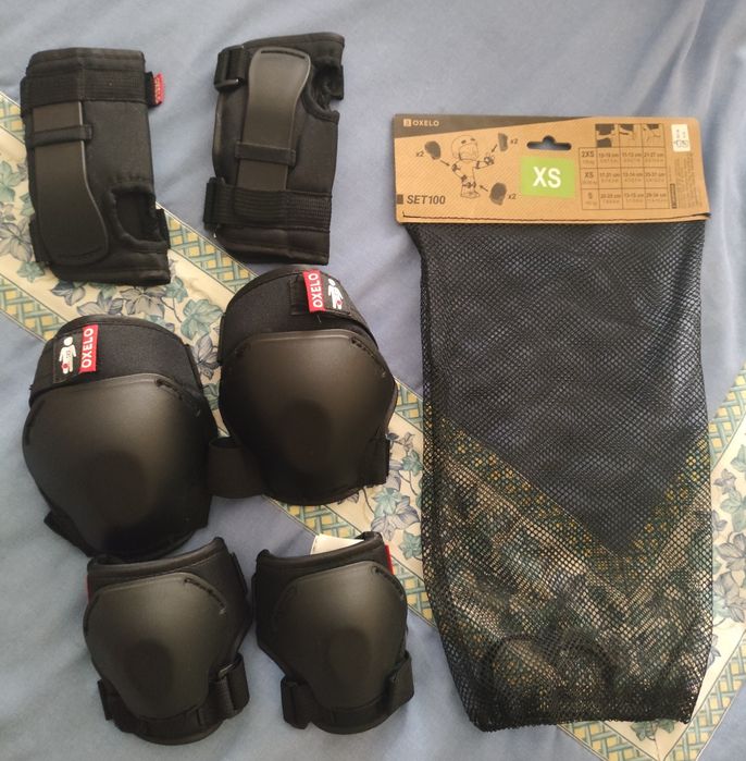 Conjunto proteções Oxelo pretas tamanho XS