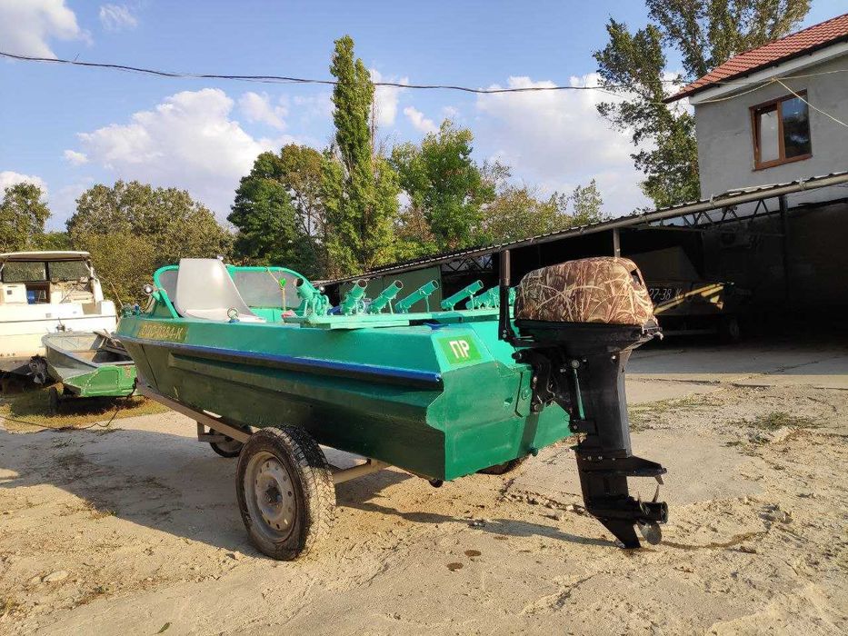 Катер Неман-1 с мотором Tohatsu M18 и местом на причале в Маяках.