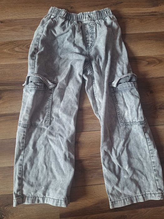 Spodnie dzinsowe szerokie 134 hm z kieszeniami