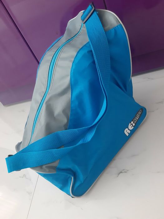 Фирменные роликовые коньки Reaction В053 вместе с оригинальной сумкой