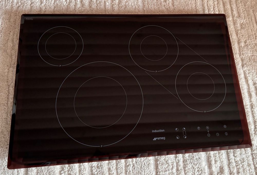 Індукційна варильна поверхня Smeg SI3842B,80см.