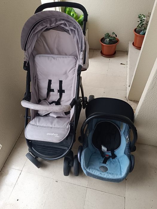 Carrinho de bebê e ovo