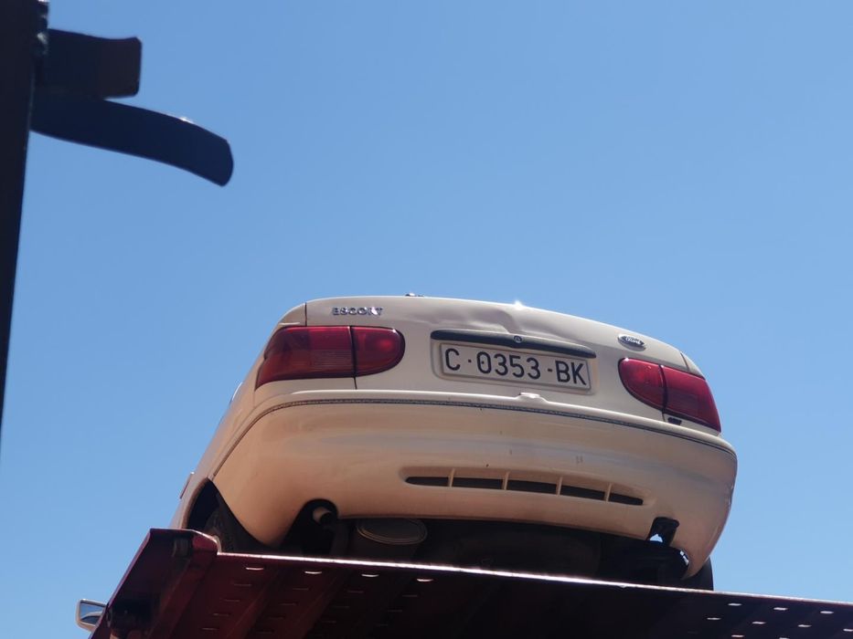 farol esquerdo ford escort