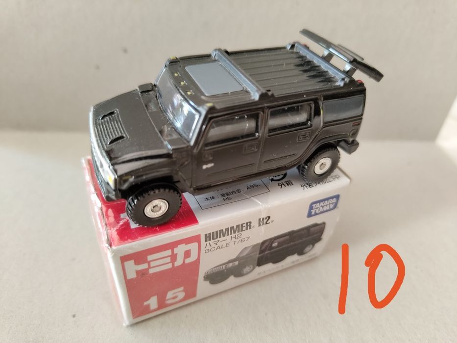 Carros tomica com caixa