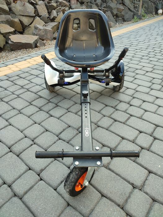 Hoverboard plus przystawka jeździk.