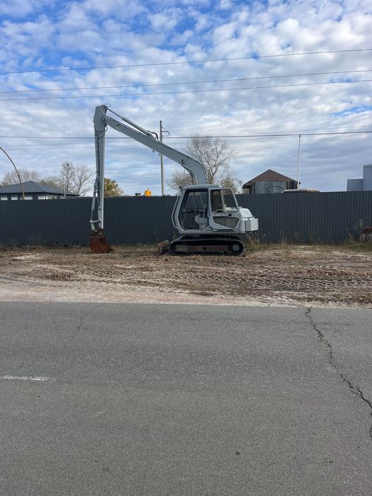 Услуги аренда оренда довгоруккого послуги роботи екскаватора драглая