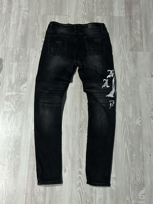 Spodnie jeansowe slim fit amiri drip haft