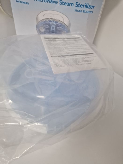 Esterilizador de biberons + 4 biberons