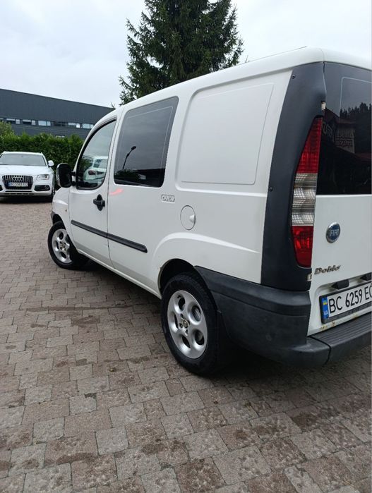 Машина Fiat Doblo