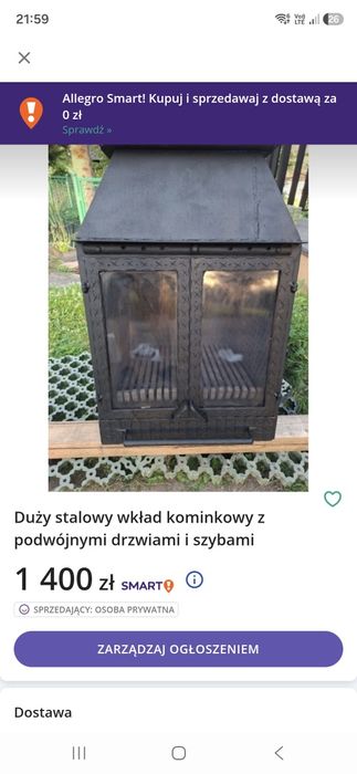 Duży stalowy wkład kominkowy z podwójnymi drzwiami i szybami