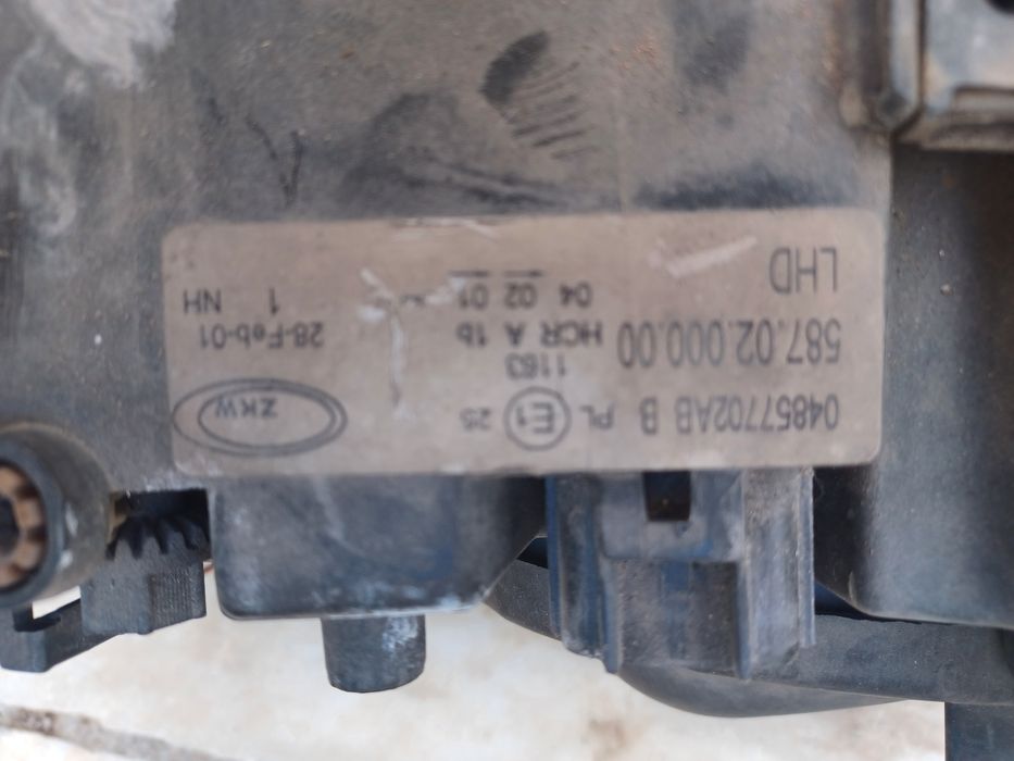 Farol chrysler voyager