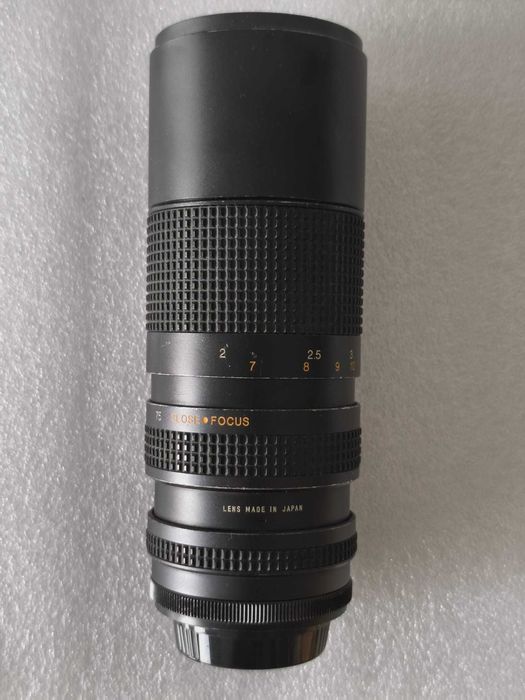 lente Tokina RMC 70–260mm f/4.5 FD lente zoom + bolsa + filtro Vivitar