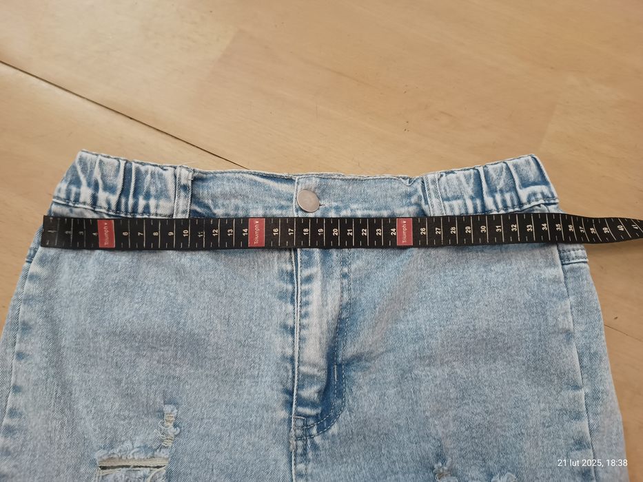 Spodnie dzwony z dziurami rozciągliwe dla dziewczynki rozm. 150