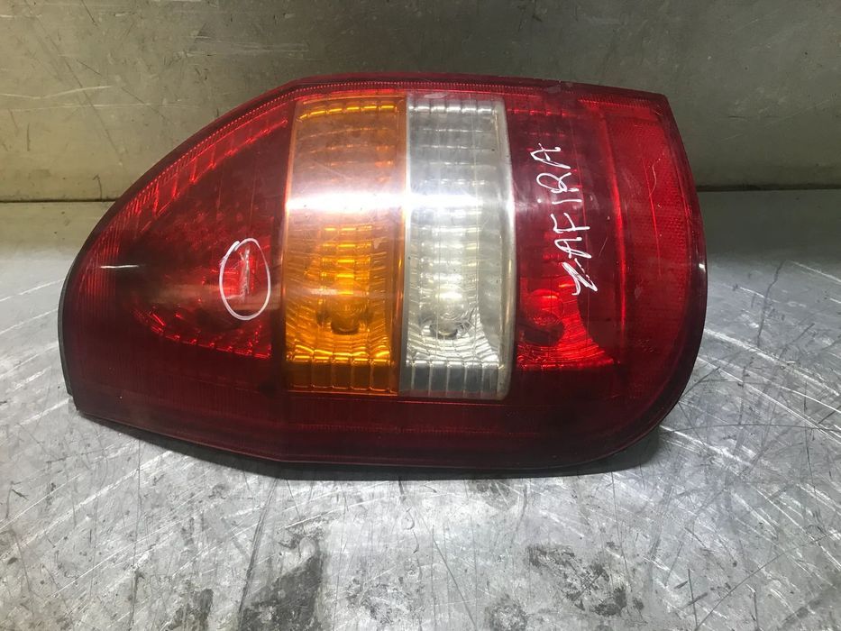 FAROLIM OPEL ZAFIRA A - DIREITO / ESQUERDO