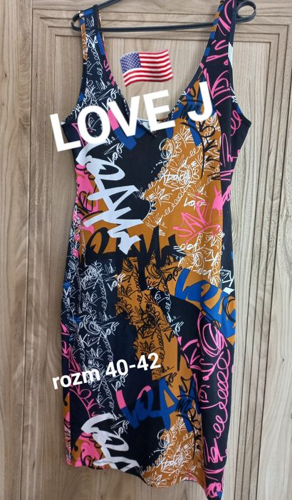 Dopasowana kobieca sukienka rozm 40- 42 USA