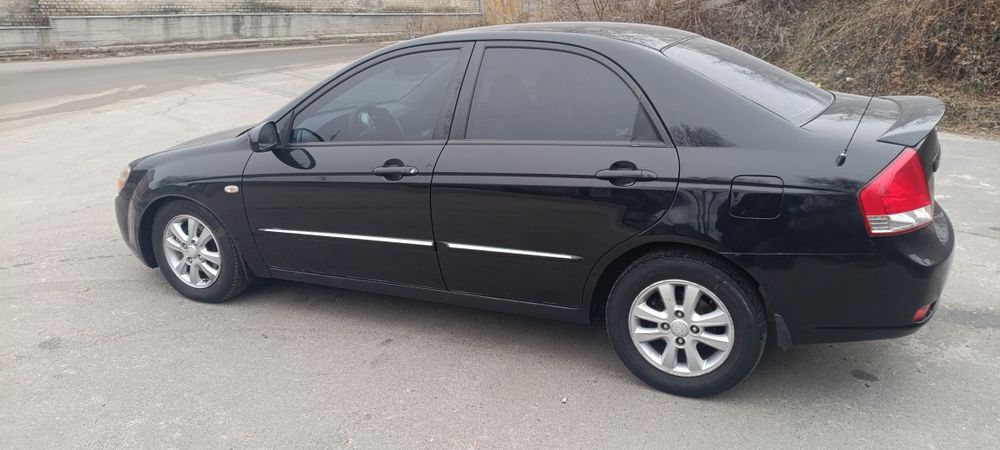 Kia cerato 2.0  Автомат газ бензин
