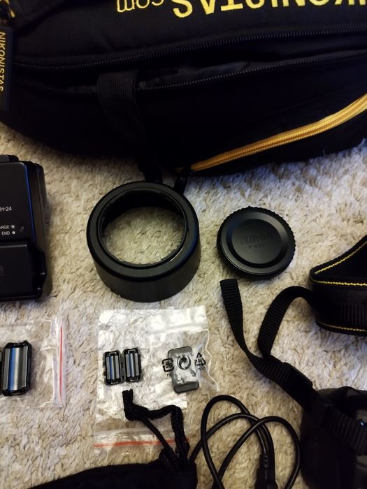 Nikon D3100 + lente extra