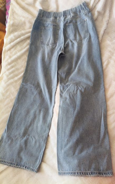Spodnie jeansy nowe bez metki Sinsay M/L.