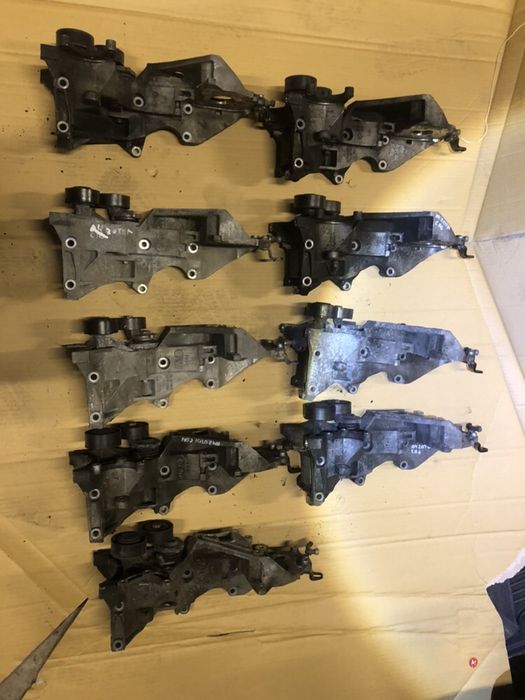 Кронштейн лапа генератора и компресора  Audi Vw 2.0tdi 03l903113R H E