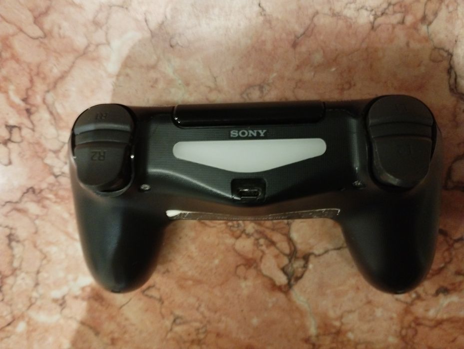 Comando original para PS4 com avaria do drift no analógico