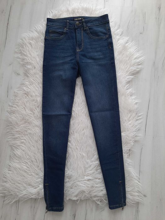 Piękne jeansy rurki wysoki stan zamki na nogawkach XS 34