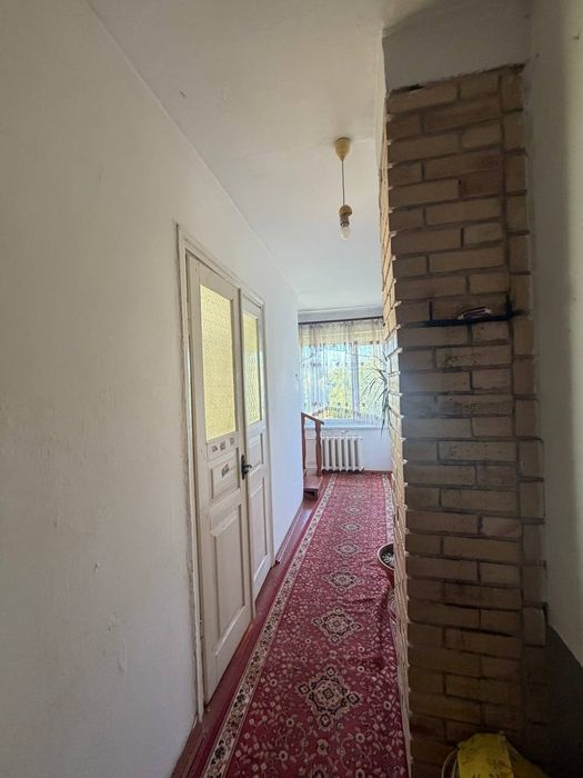 Продам  цегляний 2 поверховий будинок зі зручностями в с. Суйми  .