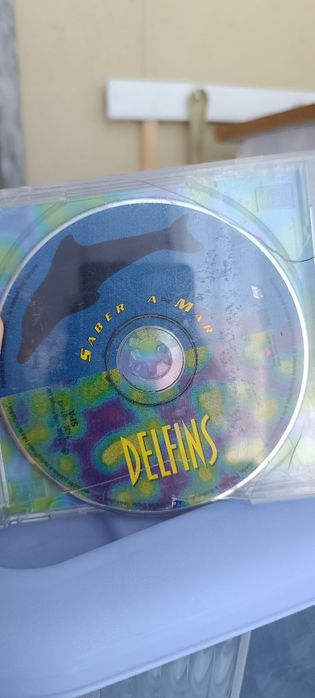 Dolphin CD Case. Damaged CD426289904464046081