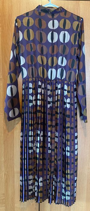 Elegancka midi suknia pastelowa geometryczna kokarda glamour vintage