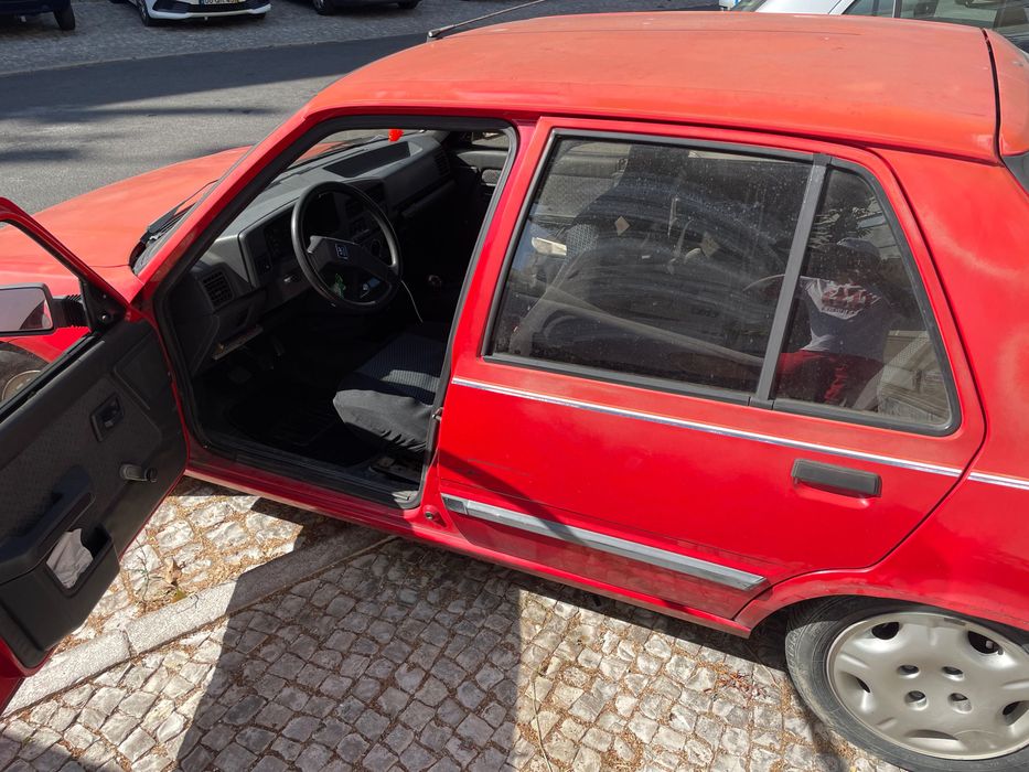 Pegouet 309 troco por moto