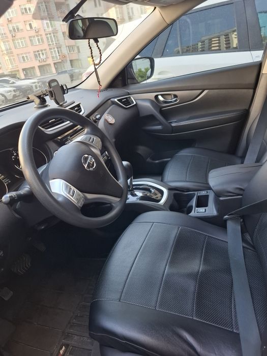 Машина Nissan Rogg